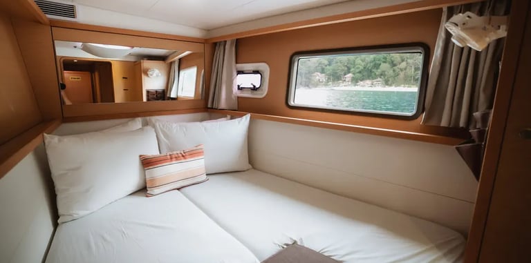 Private luxury yacht cruising through Bacuit Bay, El Nido.