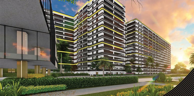 Modern luxury apartment building facade with a black and white striped exterior at sunset.