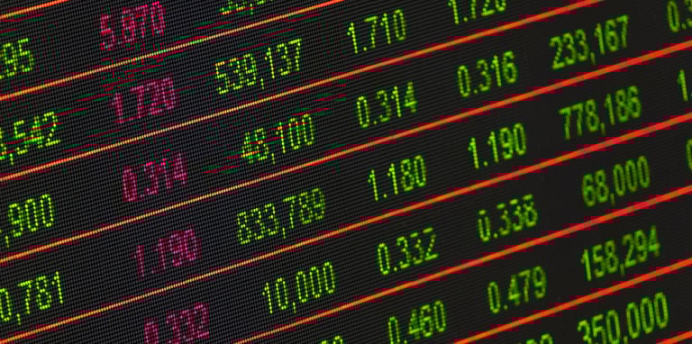 stock market investment numbers represent blog post about gold ira role in volatile markets