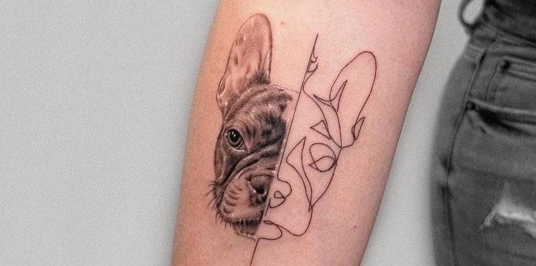 a dog is shown with a dog tattoo on the arm