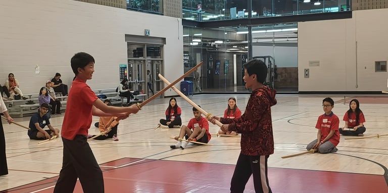 2 boys learning kenjutsu in Calgary