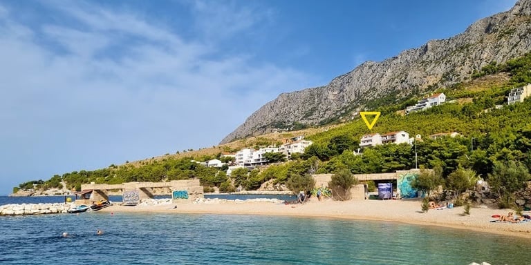 The photo depicts the house and yard with the pool as seen from the western sunny terrace.