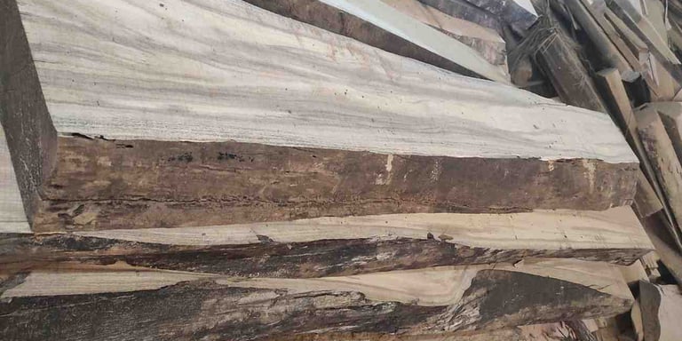 “Semi-finished teak wood block captured at 45-degree angle highlighting partial sanding and structure”