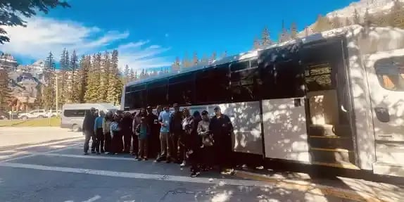 Moraine Lake and Lake Louise day tour shuttle under blue skies