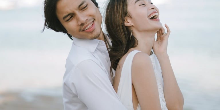 Romantic couple portrait by the beach during an intimate photography session at Novotel Bali Benoa in Tanjung Benoa Bali.