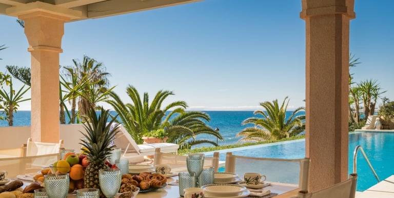 Pool area at Villa El Rincon, a luxury beachfront villa in Marbella.