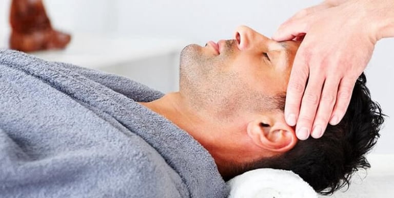 a man getting a massage at a massage parlor