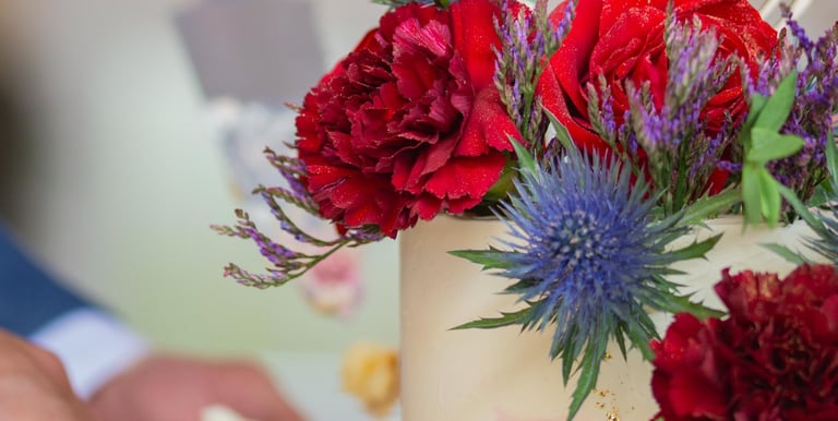 a bride and grooms wedding cake with a cake topperf