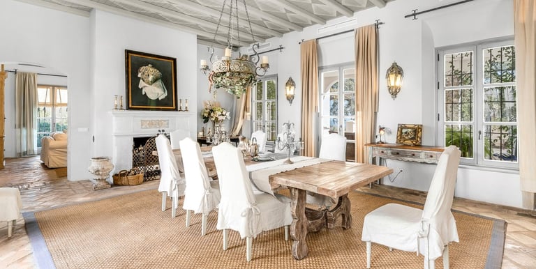 Dining room at Finca Santa Katerina with traditional furniture and chandelier