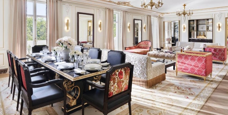 Royal Suite Dining & Lounge – Opulent dining and living area with classic décor and plush furnishing