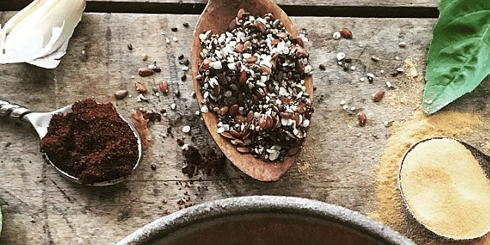 dry spices and dry garlic on a wooden table