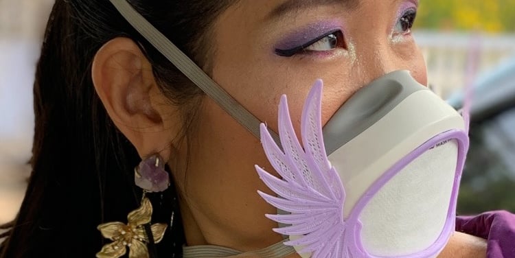 Female face with Flomask and Wings decoration