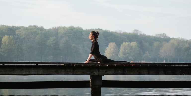woman doing pigeon pose