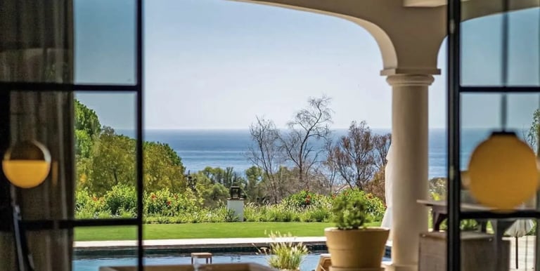 Covered terrace at Villa La Gratitud with sea views and al fresco dining