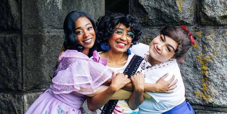 Mirabel, Isabela, and Luisa share a family hug