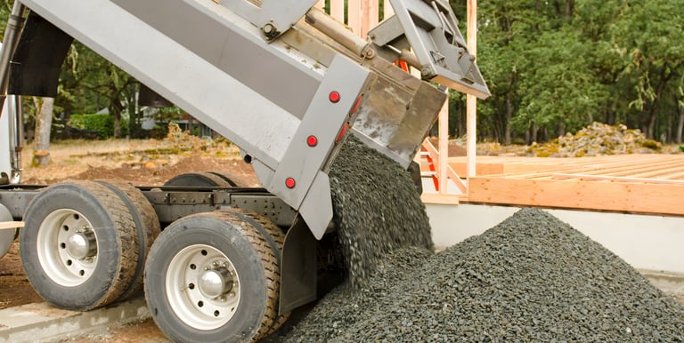 aggregate placement for commercial construction site support