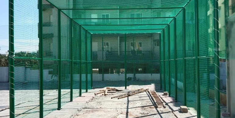 Close-up of durable sports netting stretched tightly across a rooftop space.