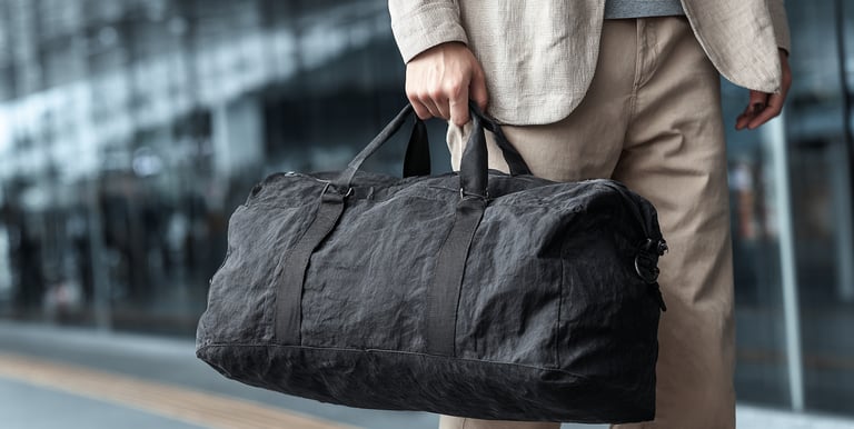 a mmen with a Lightweight duffle bag for promotional use