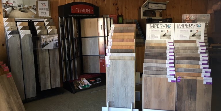 a room with a lot of wood flooring and a lot of wood flooring