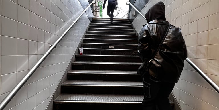a man in a black jacket and a woman in a black jacket