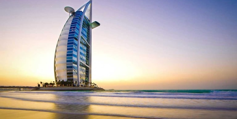 Burj Al Arab at sunset in Dubai, symbolizing luxury living and the city’s prime real estate market.