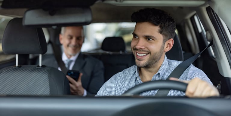 Executive is riding a car