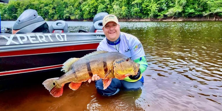 a man holding a fish