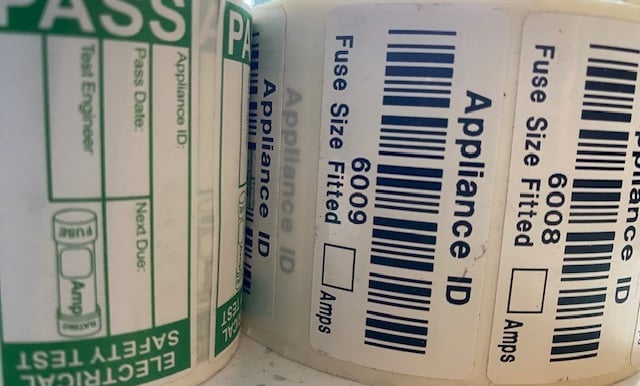 a selection of PASS and barcode labels
