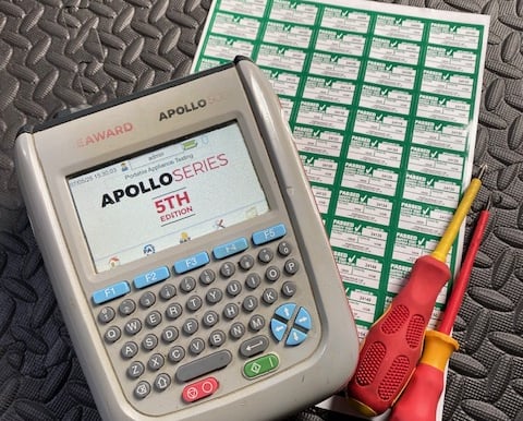 Seaward PAT tester and some labels and a screwdriver