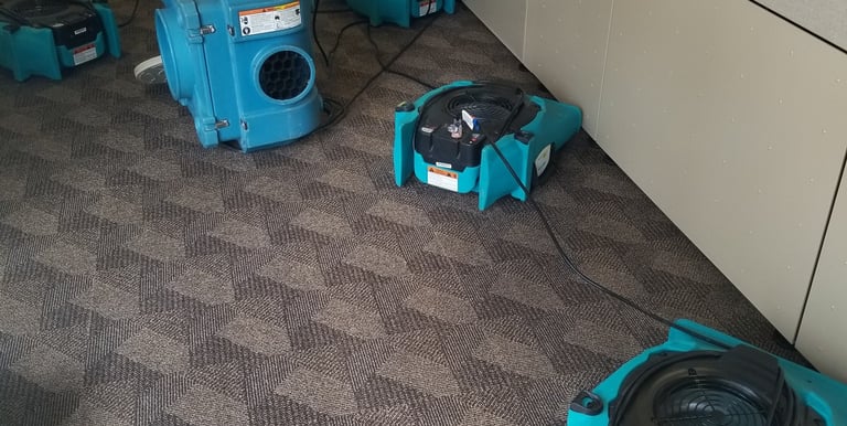 a room with several blow dryers and a few other blowers