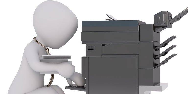 Technician working on a Printer