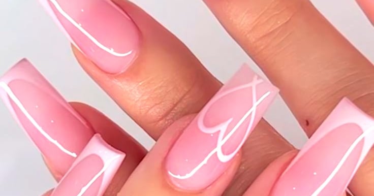 a woman's hand painted nails and nails on her nails