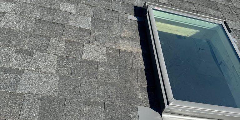 Roofing contractor repaired leak around skylight