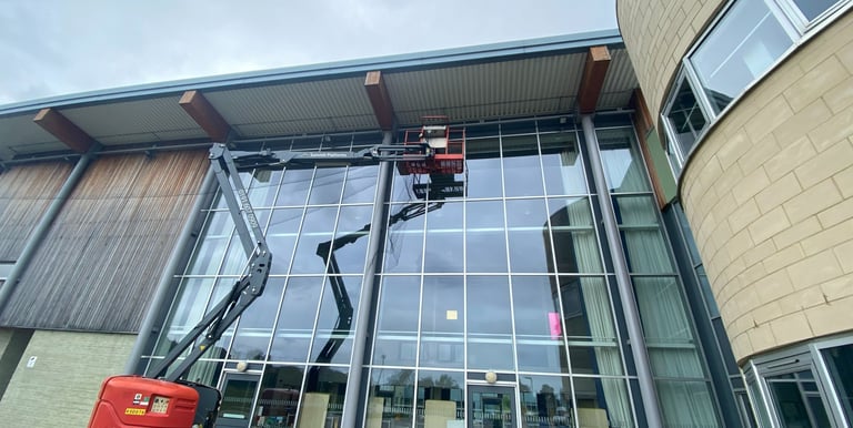 netting fitted to a school from a MEWP 