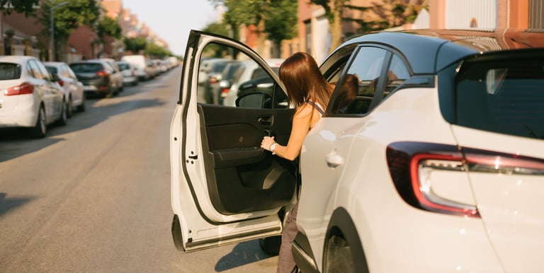 Driver getting into a reliable weekly rental car for gig work in Tucson Arizona