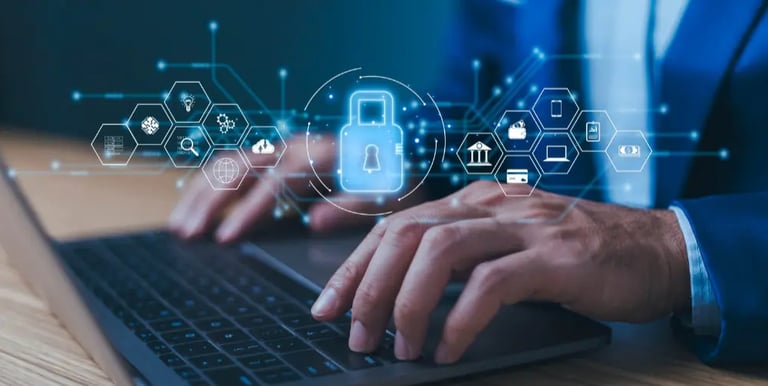 A business man is registering an IP with his laptop