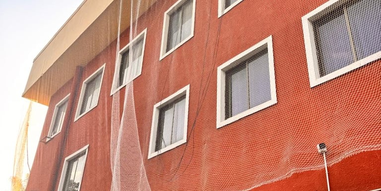 Balcony pigeon net fixed in Malabar Hill high rise residential building