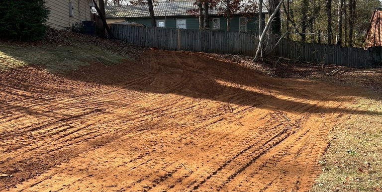 Filled area of yard to allow for proper drainage and a great lawn.