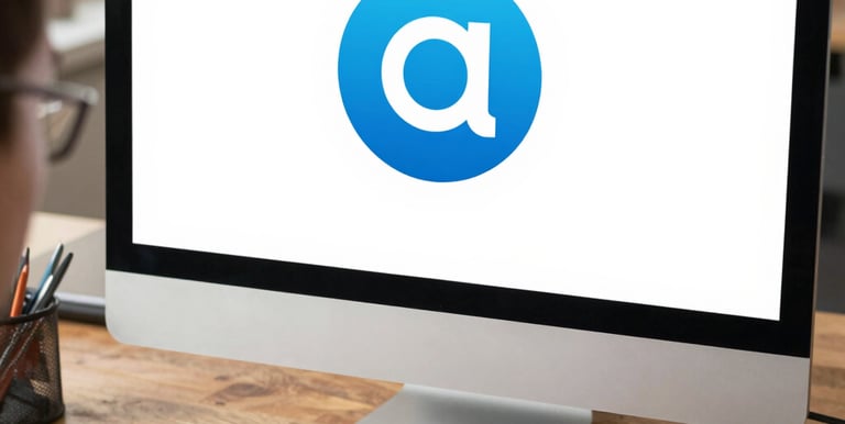 Close-up of hands working on a vibrant logo design on a computer screen.