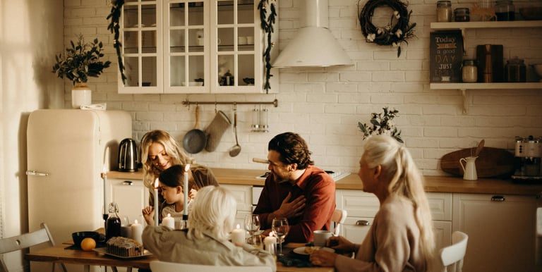 a family sitting around the dining table