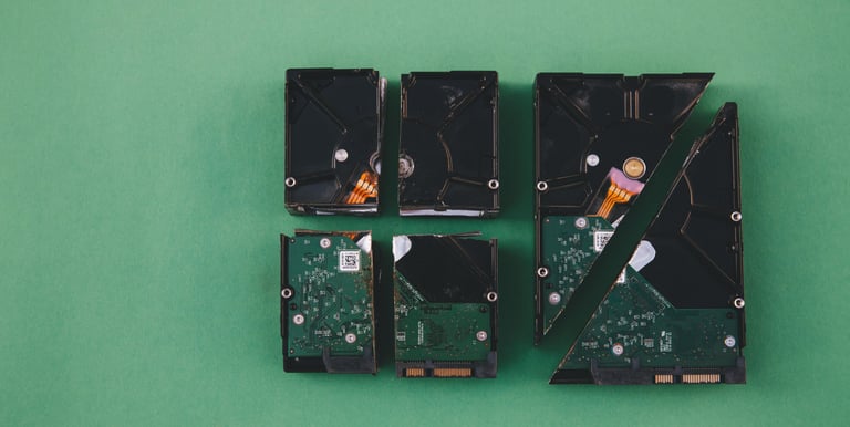 A hard drive cut into many parts