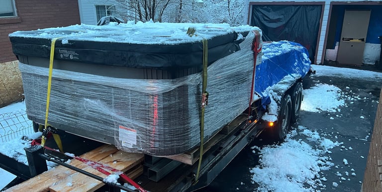 A hot tub on a trailer to be hauled away