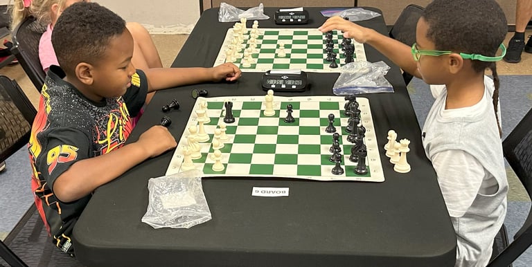 Children playing chess at a practice chess tournament at the Henderson Multi-Gen Rec Center in NV