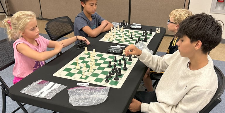 Children playing chess at a practice chess tournament at the Henderson Multi-Gen Rec Center in NV