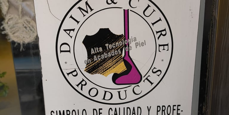 A sign that say that we're experts in leather and skins