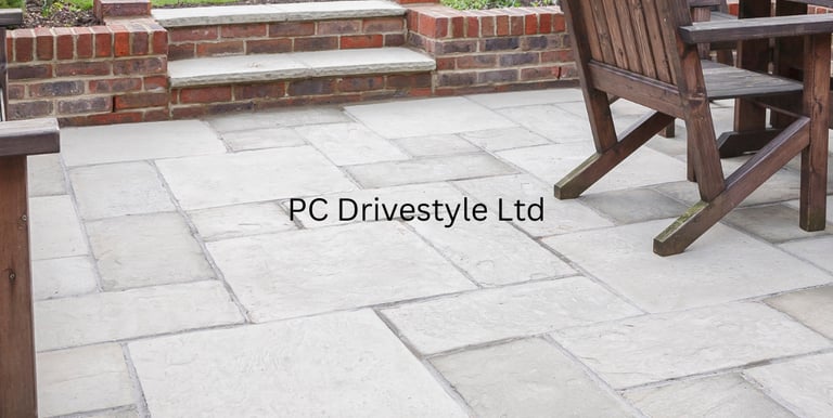 white stone patio in garden by PC Drivestyle Ltd
