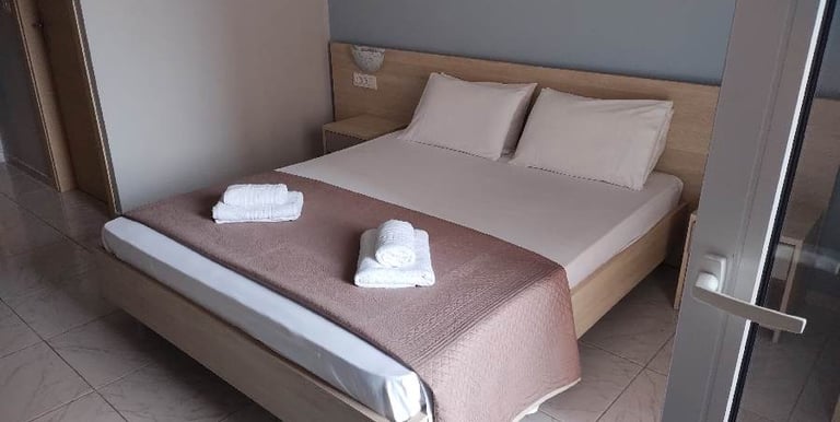 a bed with towels and towels on it