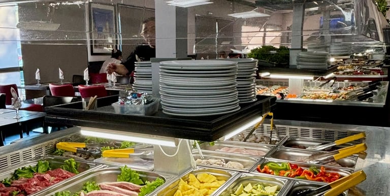 a buffet with a variety of different types of food