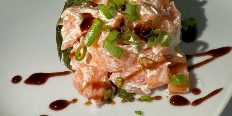 a plate of food with sauce and sauce on it