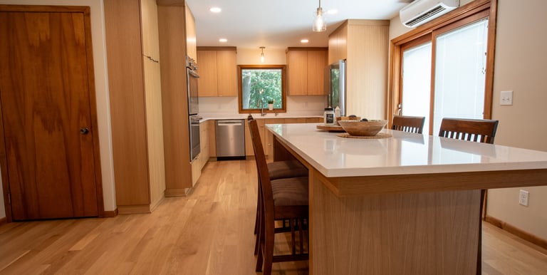 European kitchen cabinets in white oak and Cambria counter tops. 